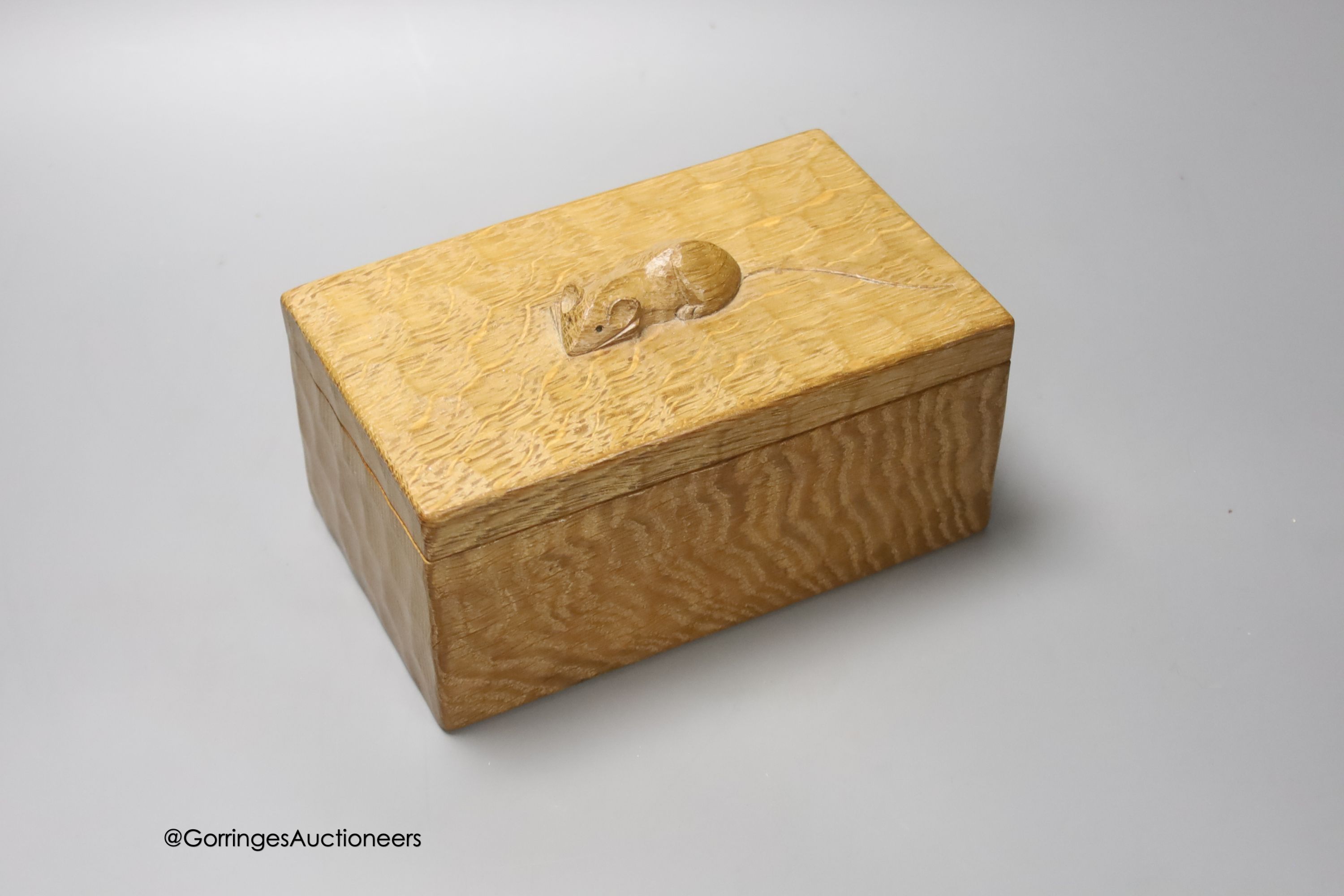 A Mouseman carved oak box and cover, 19cm